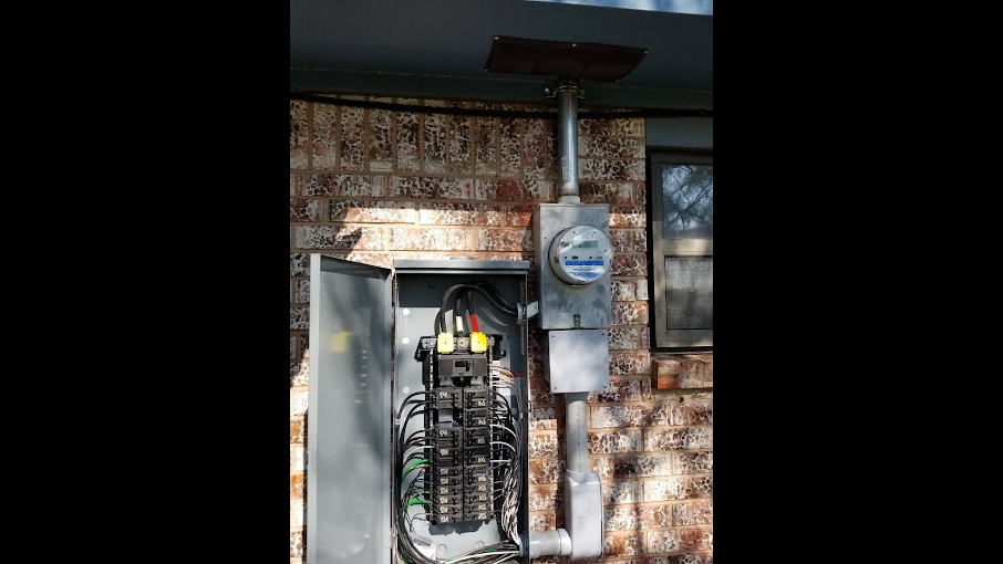 Electrical panel and utility meter installed by DC&AC Electric